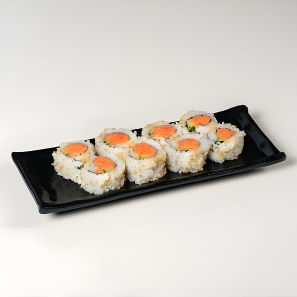 Eight pieces of Taro's Japanese spicy salmon sushi rolls with sesame seeds on a black plate.